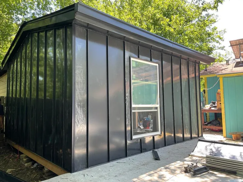 Black standing seam metal wall panels for Roof Inspection in Madeira