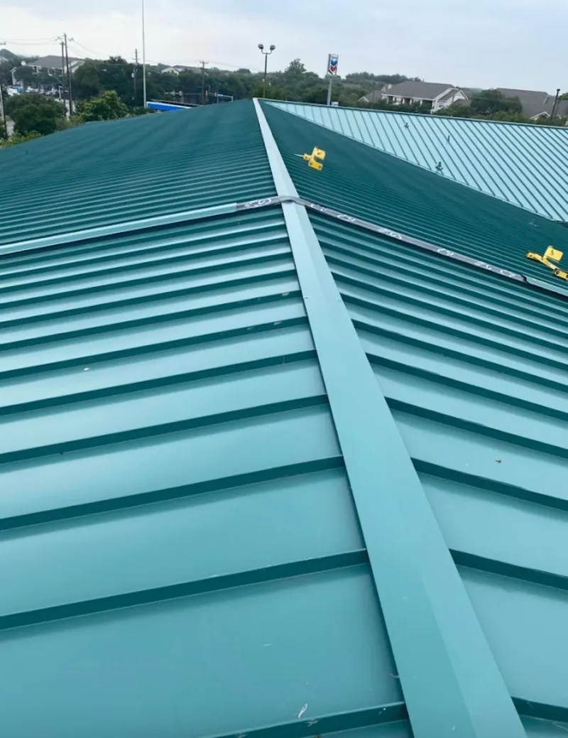 Green commercial metal roof ridge and valley for Metal Roof Repair in Madeira